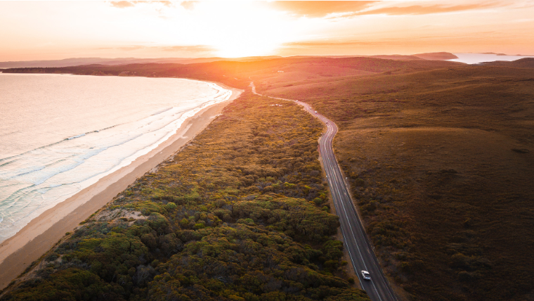 Removal truck on a coastal NSW highway at sunset