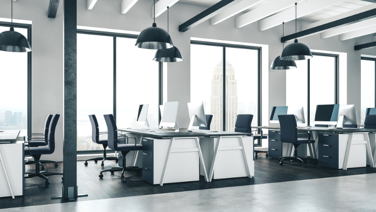 Modern office interior with desks and chairs
